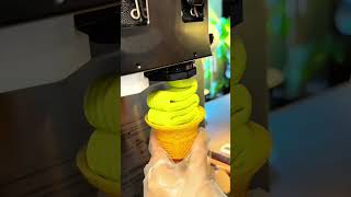 Swirling Soft Serve Yellow Ice Cream Cone