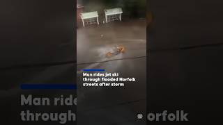 Man rides jet ski through flooded Norfolk streets after storm