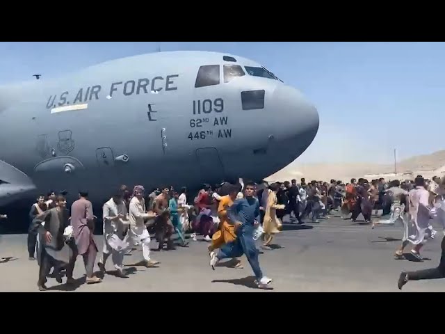 Watch: Afghans Run Alongside U.S. Military Plane At Kabul Airport class=