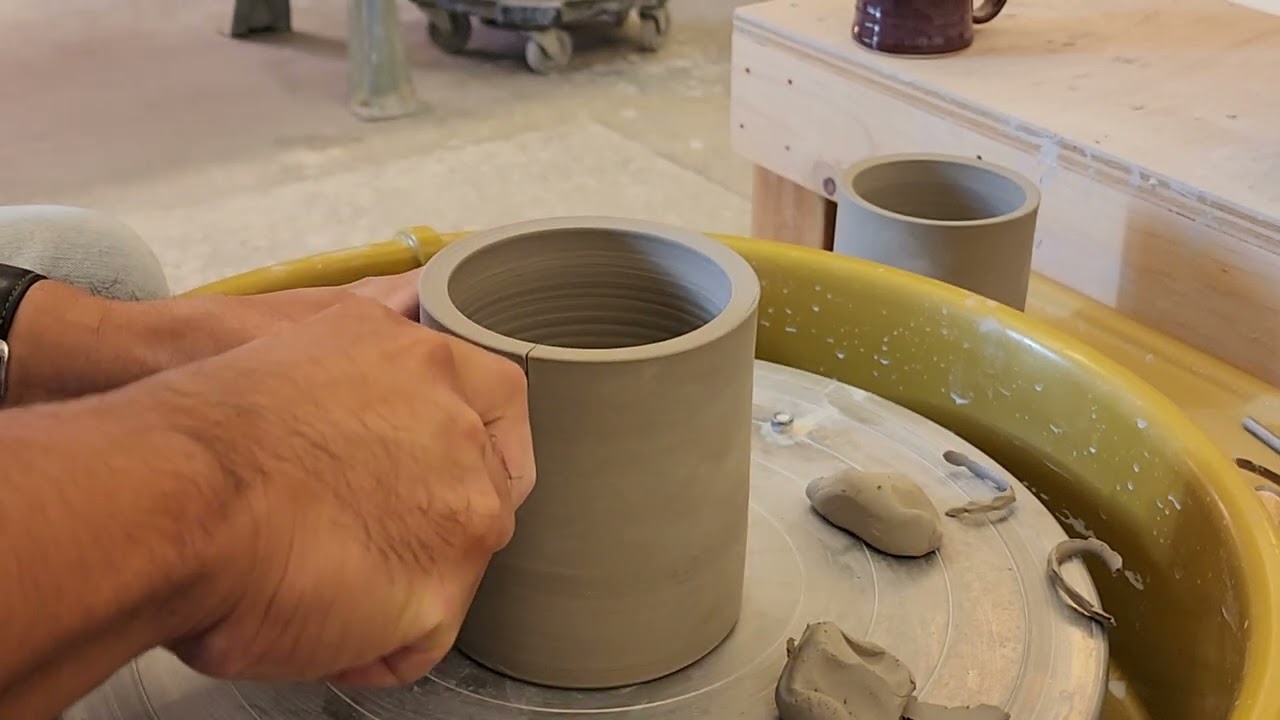 Trimming a foot on a wheel thrown cylinder. YouTube