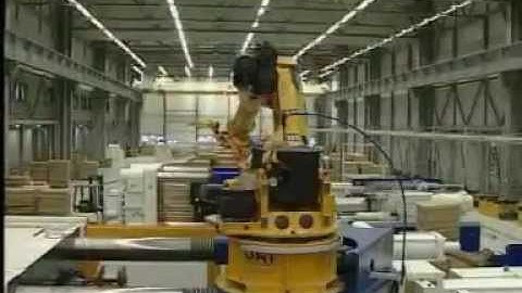 Handling of Smart bumpers at a plastics processing machine with a KUKA robot