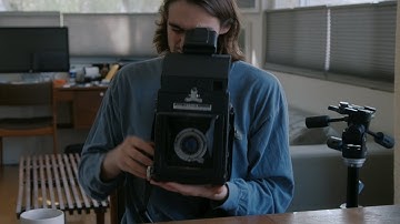 Modified Graflex RB 4x5 with prism finder breakdown.