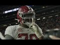 Alabama players celebrate in Auburn student section