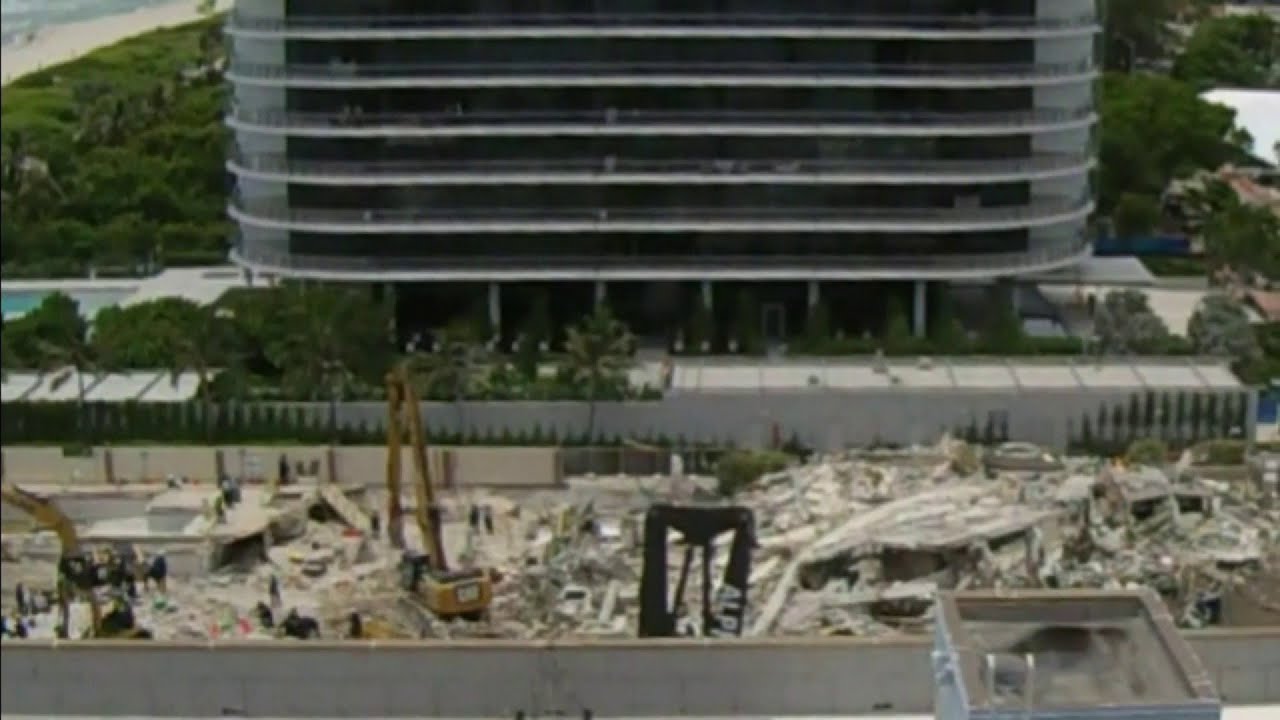 Death toll rises to 27 as search efforts continue following demolition of remaining Surfside str...