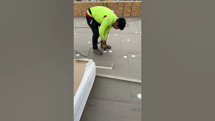 Attaching ISO roof insulation.