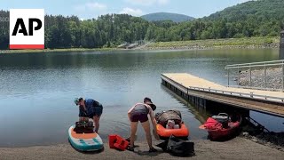 Campers use paddle boards to escape Vermont heat dome Profile