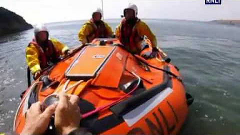 Porthcawl RNLI rescue two people cut off by the ti...