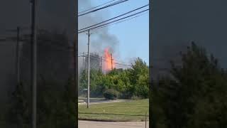 Crews battling hazmat fire at Akron business