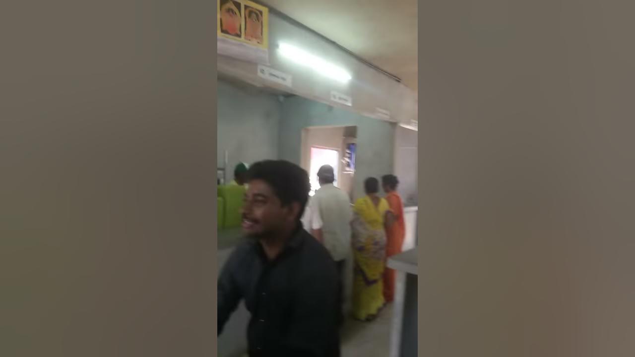 inside government run indira Gandhi canteen , people eating food