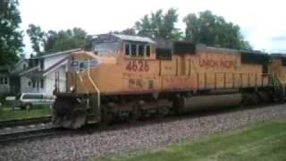 Fannin Rochelle IL 09 part 6, Nice meet!
here is part 6 of rochelle railfanning railfaning in 2009. i have no clue when i will have all the videos done, i have easily 15 more to post, plus a bunch from grand forks, and railfanning from home. wow im swamped right now. just to keep you guys and gals updated. also you HO scale fans, im still waiting for a new camera to come, so when i get that i will do a layout update, i know i havent done one since april. also in the upcoming videos you will everything. i mean you will see SF SD75ms sneek out of hiding! they are still in their warbonnet heritage!, fakebonnet dash nines, SD60ms in pumkin colors, nice meets, lots of nice GE and EMD action, CSX B40-8s UP SD40-2s GP38-2s, llpx units, a BNSF and a BN Sw1500 and UP manifest that came through when i was railfanning with lenavideos that had 8 engines including an ex SP dash nine and a UP GP60. STAY TUNED! the song as always livin on the edge by aerosmith. IM GIVIN YOU PUBLICITY STEVEN, GET WELL SOON!!!!
lol im not trying to talk like a gangster in the title either.
oh and for those of you that cant wait the meet is at about 5:40
oh and BTW i dont feel like listing the unit types and numbers right now, im just going to list the time and dates, sorry, im lazy
ok in this issue westbound UP manifest creeps by at 1:06 PM, then an Eastbound BNSF manifest goes by at 1:17 finally, a UP eastbound manifest meets a westbound manifest at 1:33 PM, nice horn duel too :D. look at those ex amtrak boxes on that 2nd train. Fannin Rochelle IL 09 part 6, Nice meet!