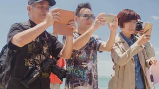 Women fight to Free the Nipple as they go topless on a New Zealand beach but claim the protest att