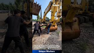 Mechanics Use Suspended Battering Ram to Remove Stuck Excavator Pin