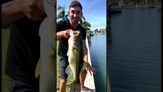 Man catches large mouth bass in old man’s canal