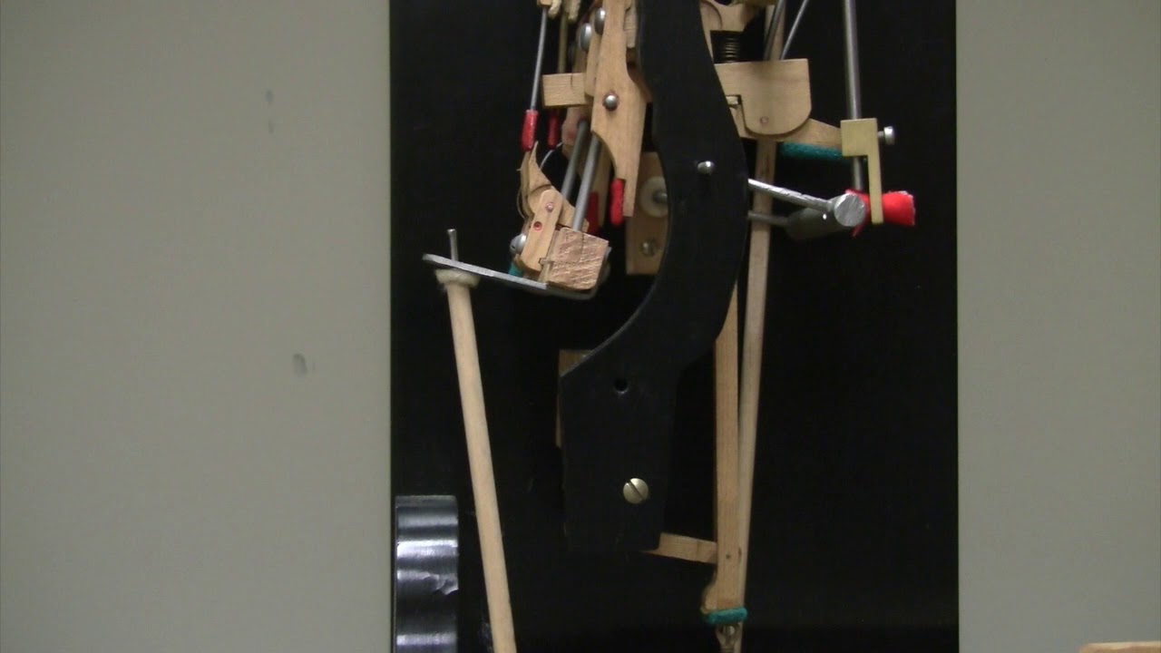 Upright action model with sostenuto, close up of sostenuto mechanism
