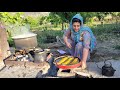 Cooking stuffed salmon in iranian village style