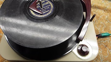 Webcor record player playing 2 different size records automatically.