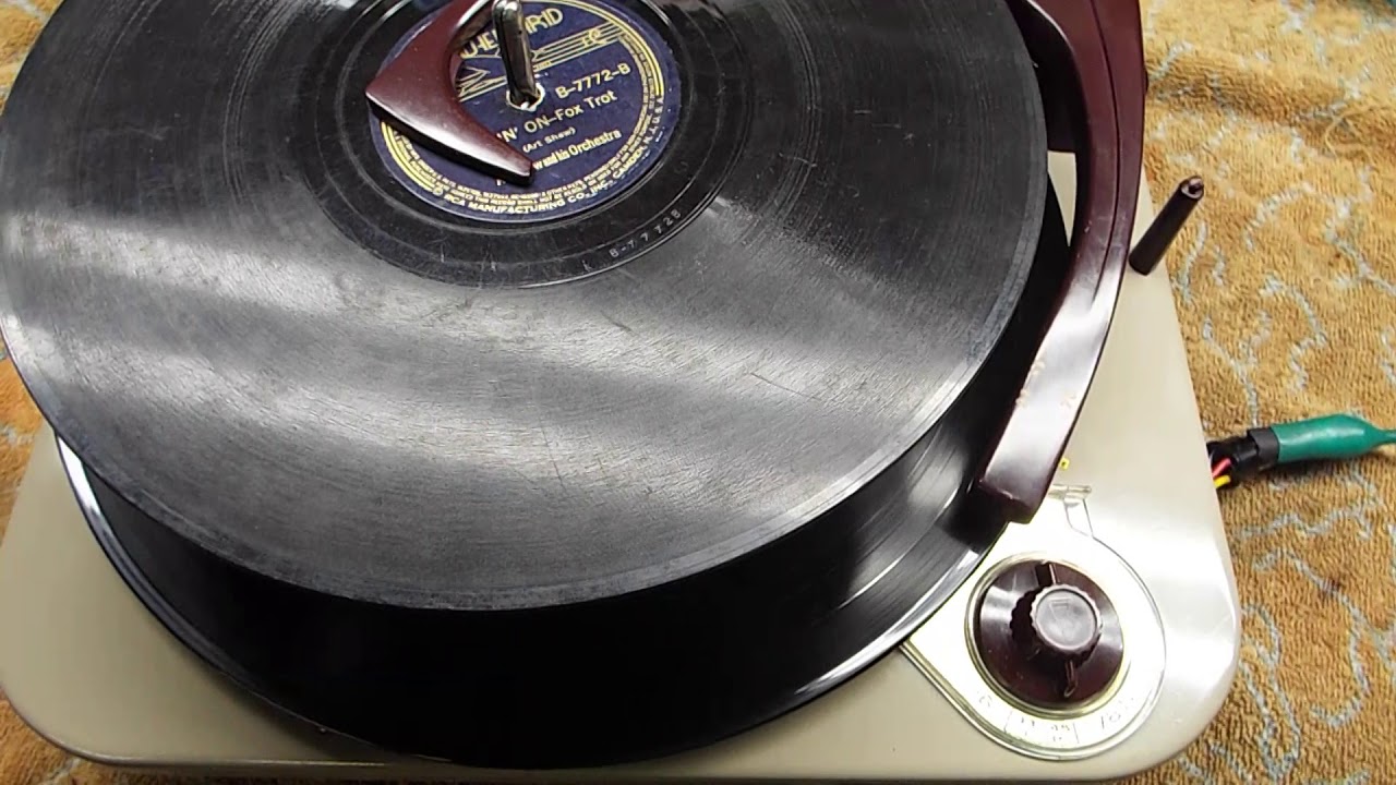 Webcor record player playing 2 different size records ...