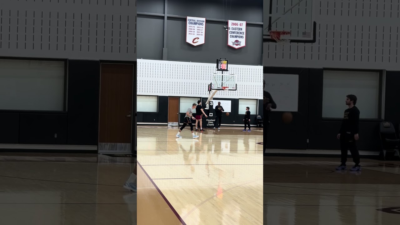 Sam Merrill goes through shooting drill as he works his way back from right hand injury