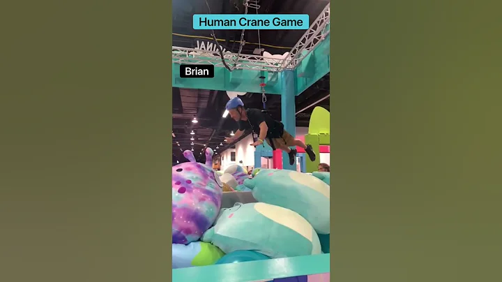 Giant squishmallow human claw machine!!  Who got t...