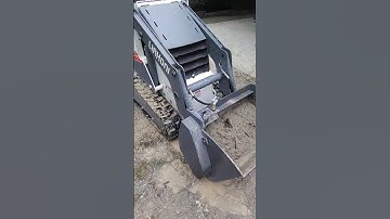 LIAKONI 922 tracked mini loader with concrete mixer attachment.