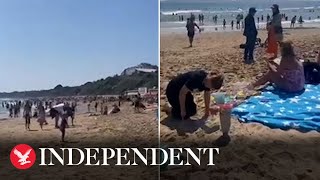 Bournemouth beach packed with tourists one day after children died in tragic accident