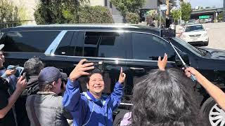 Lenny Kravitz waves at fans in Hollywood