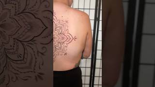 Beautiful large mandala back tattoo by Jess Tudor