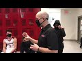 Kent City basketball coach David Ingles shares encouraging words in Orchard View locker room