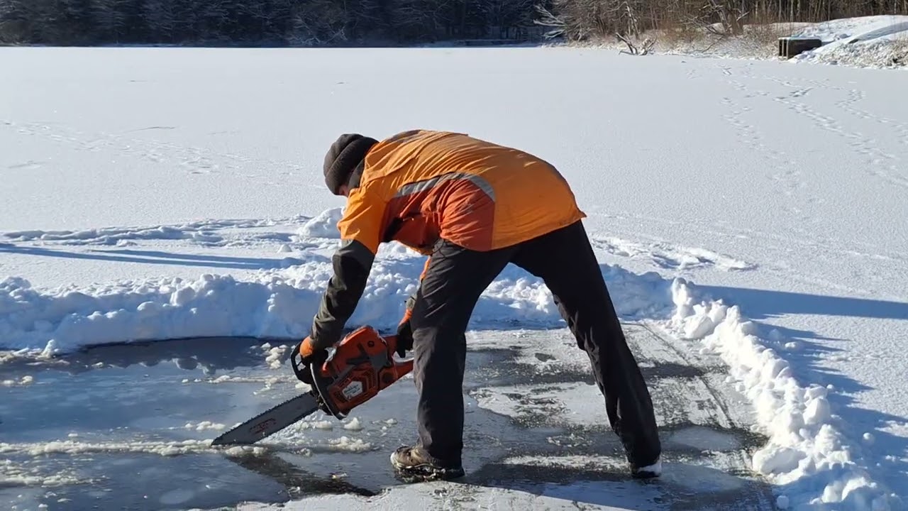 Cutting Ice on a Frozen Lake with chainsaw Husqvarna 560XP | Extreme New Year Ice Bath Prep