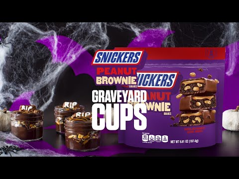 SNICKERS Peanut Brownie Graveyard Cups - Easy to assemble, this Snickers dessert cup is the perfect ghoulish sweet treat for Halloween.
