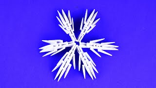 Простая снежинка из бумажных модулей оригами. Пошаговая сборка для начинающих Простая снежинка из бумажных модулей оригами. Пошаговая сборка для начинающих