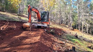 Steep hillside road repair and building with the Kubota KX 040 4