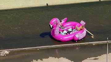 VIDEO: Group floats down Los Angeles River in inflatable pink flamingo raft | ABC7