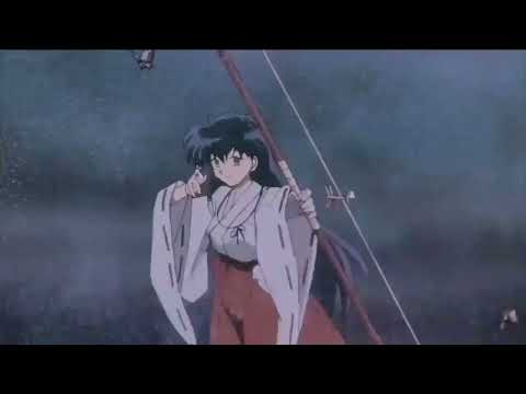 Kagome shoots Inuyasha with an arrow