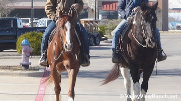 Carmen Merada and William - riding in town! - ValleyViewRanch.net