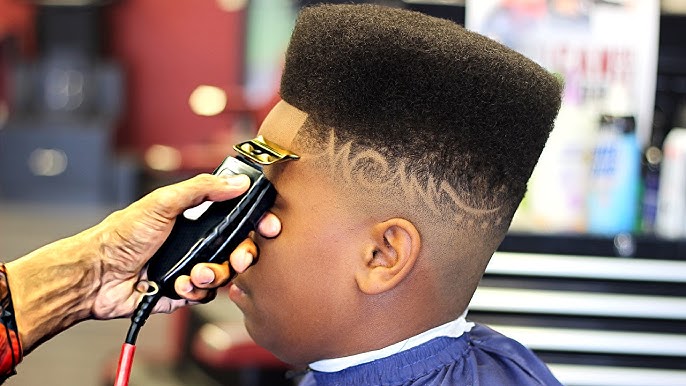 Iman Shumpert cuts his high top fade