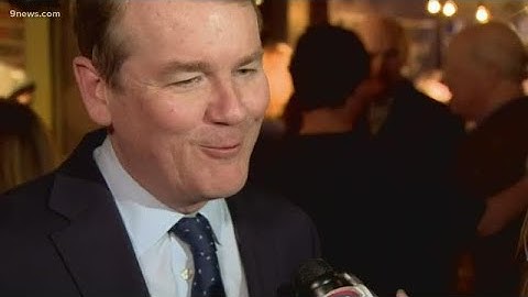Sen. Michael Bennet speaks after announcing he