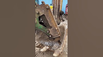 Use a breaker to clean the concrete in the bucket- Good tools and machinery make work easy