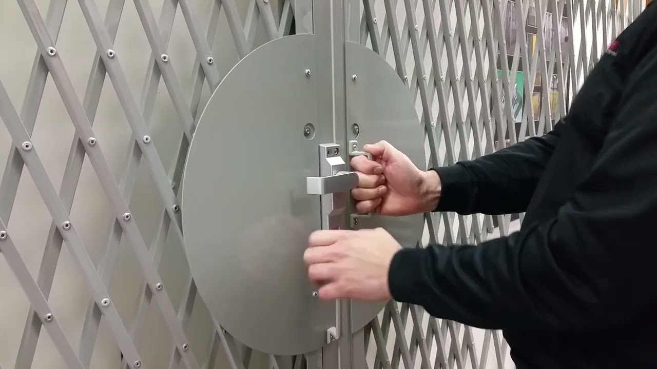 Xpanda storefront door security locking gate with ADA handle, inside