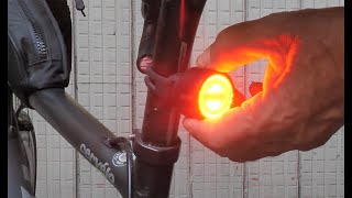 OLIGHT BS100 . Luce posteriore con accelerometro  per bici .  unboxing e test