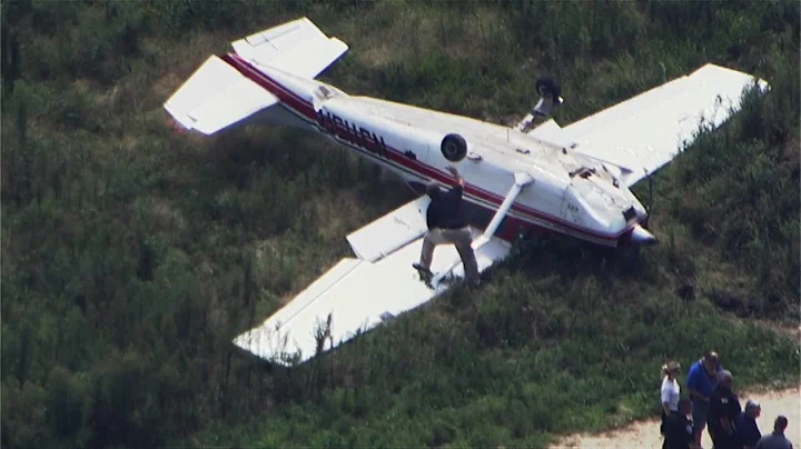 Raw Video: Plane Flips Over At Hanson Airport Days...