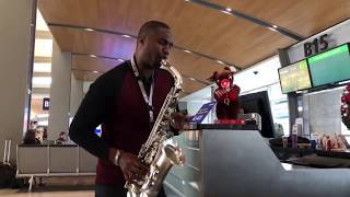 Video thumbnail of "Eric Darius - Airport Sax Off with Rudolph"