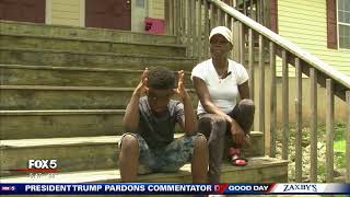 Meet the boy who helped a woman up stairs