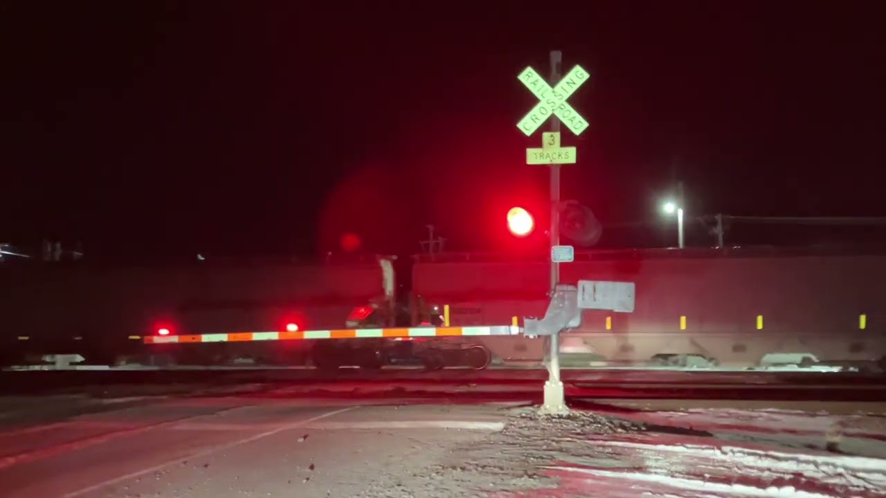 UP 8677 Manifest Train/Empty Coal Train West, S. 6th St. Railroad Crossing, Missouri Valley IA
