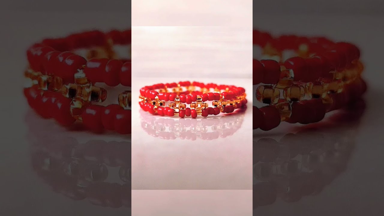 Premium Photo | Womens bracelet with red pearl 01