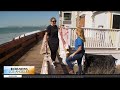 Waves weaken after causing destruction along Long Beach coast