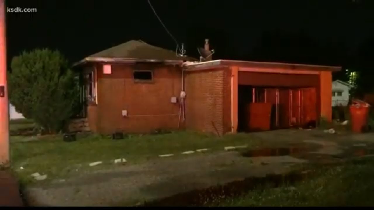 Woman rescued from burning home in East St. Louis - YouTube