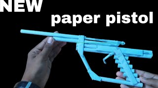 How to make paper gun that shoots paper bullet || origami paper pistol || paper gun