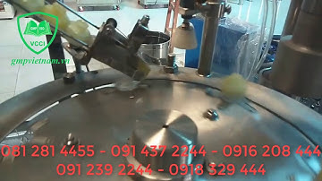 Máy chiết rót 4 vòi có cấp vặn nắp chai tự động