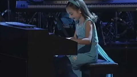 Emily Bear, child prodigy pianist plays at Noche de Niños